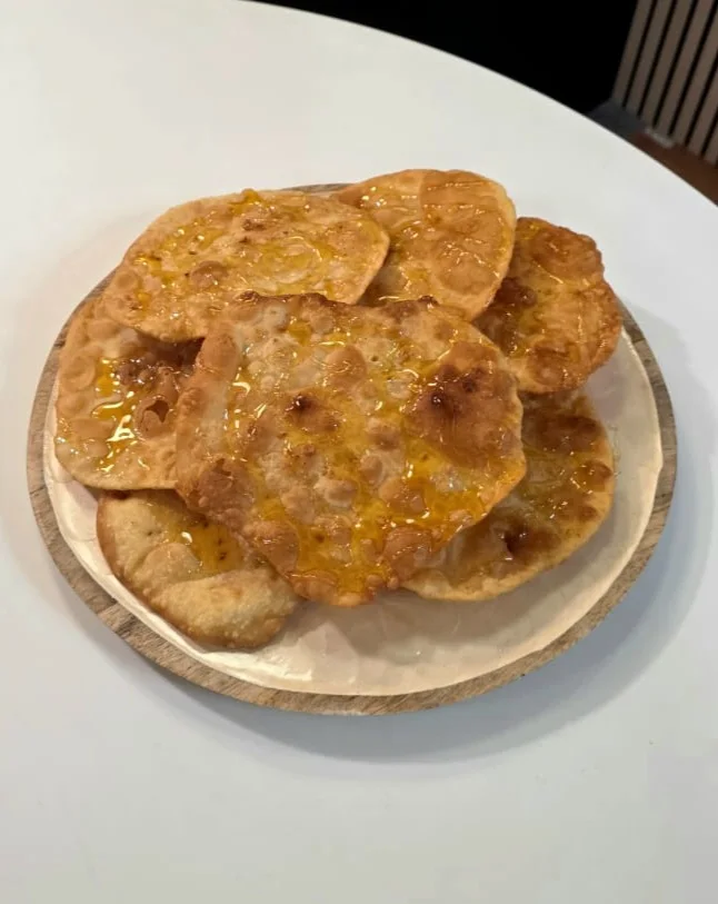 Cypriot Fried Dough (Pisies) with Zivania - Recipe image
