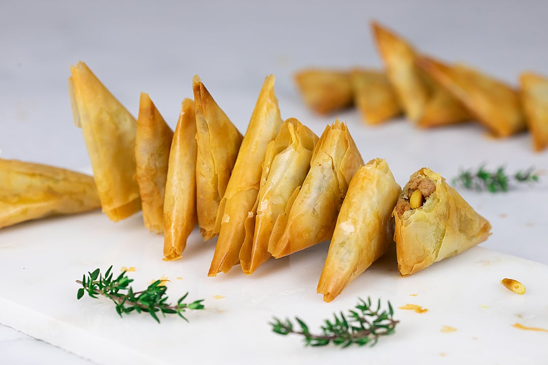 Spicy Ground Meat and Pine Nut Triangles - Recipe image